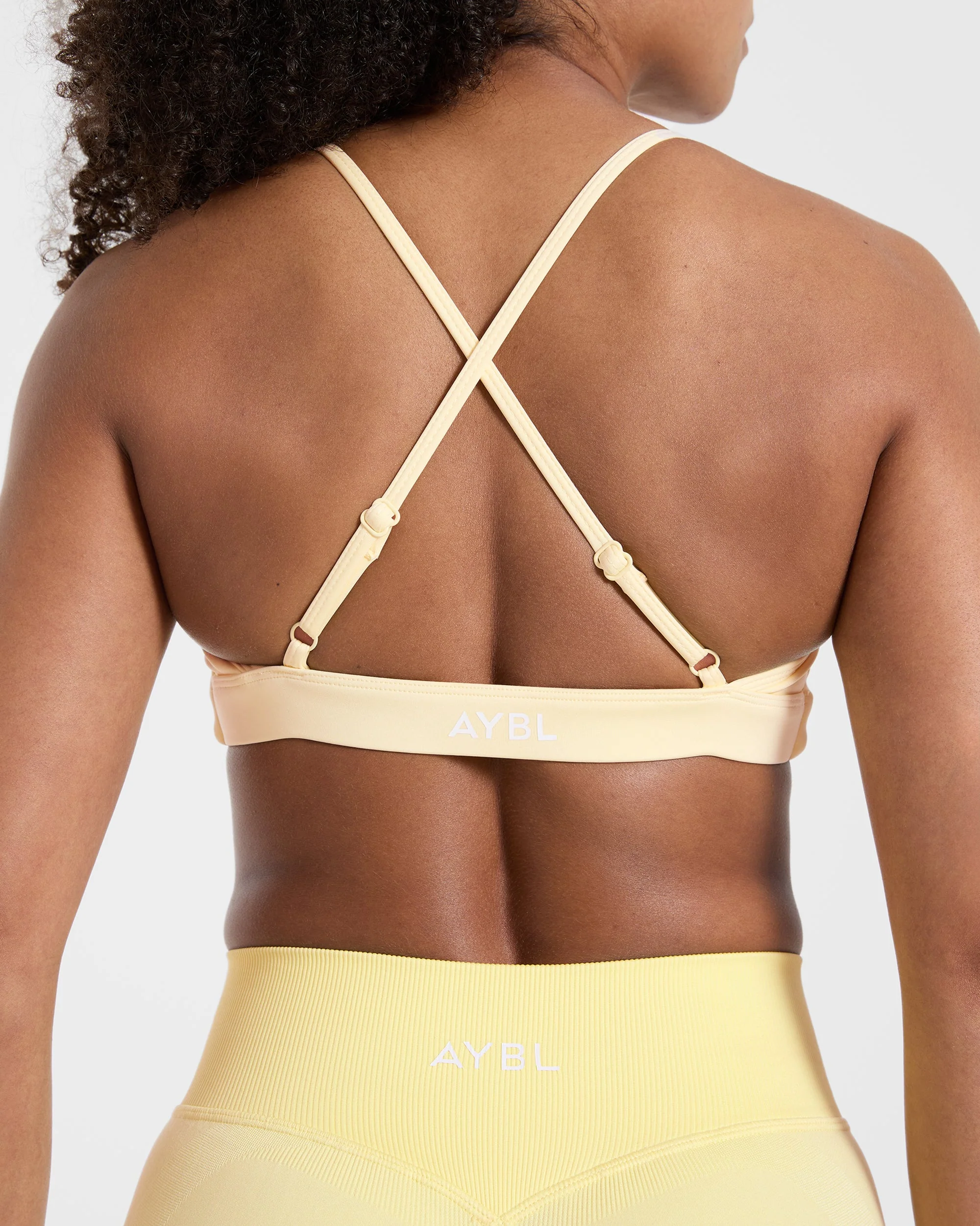 Essential Twist Crossback Sports Bra - Geel - Image 6